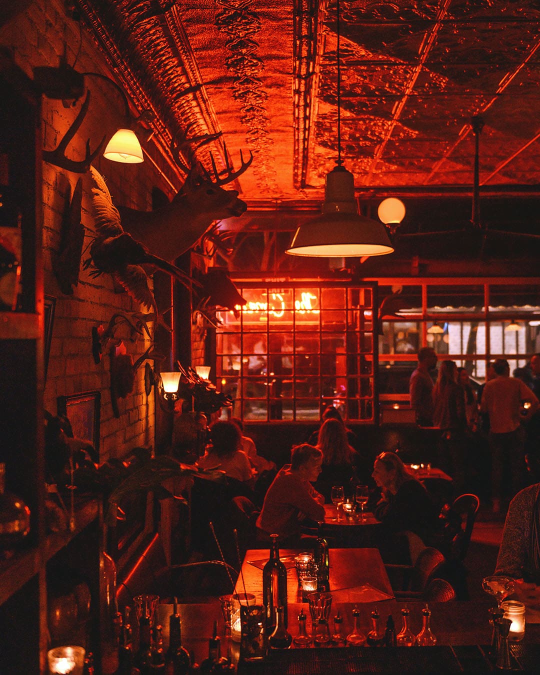 Red lanterns reveal details in The Comrade Bar, an unique venue to drink in