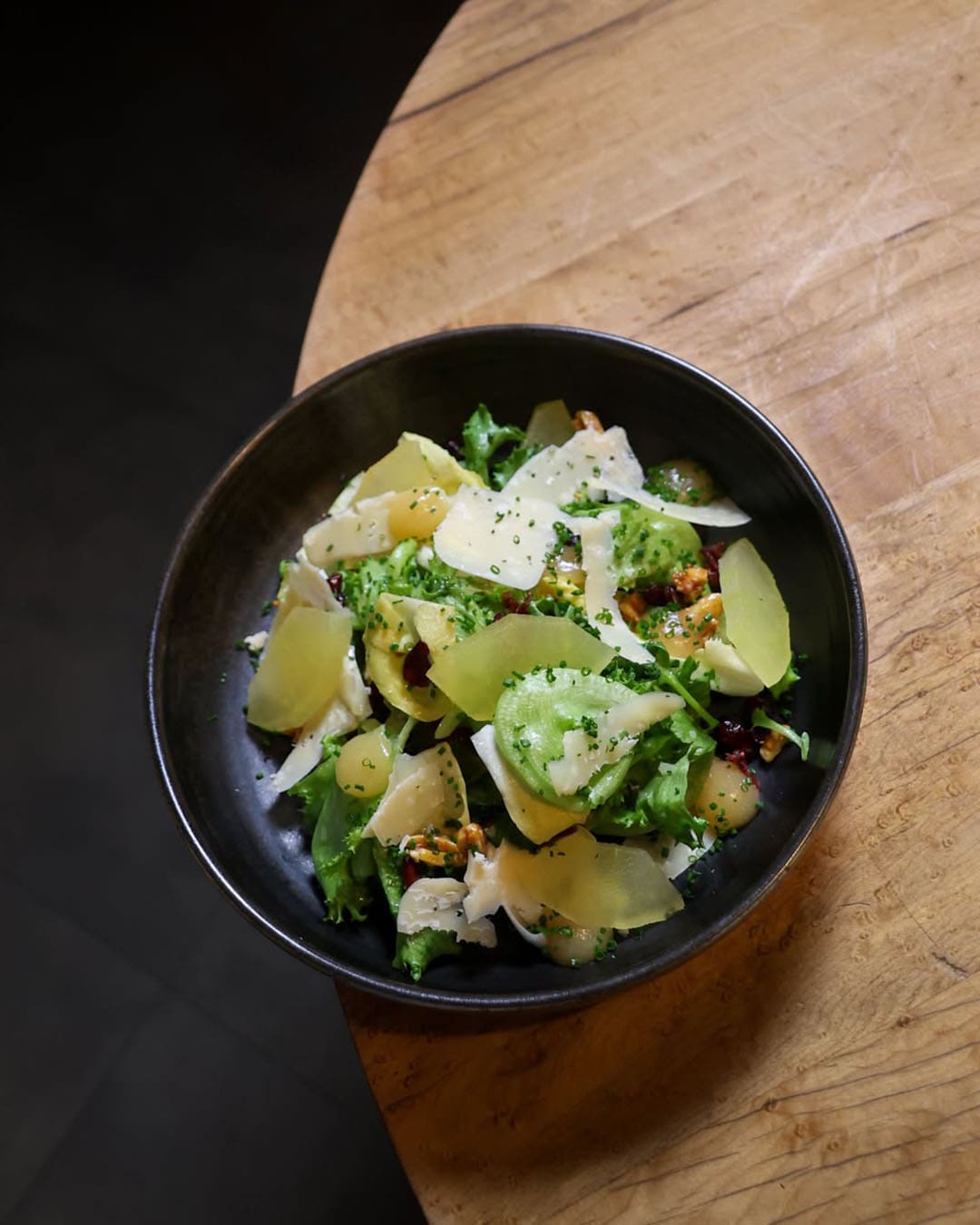 Spring salad at Richmond Station with shaved apples, mountain oak gouda and orange candied almonds