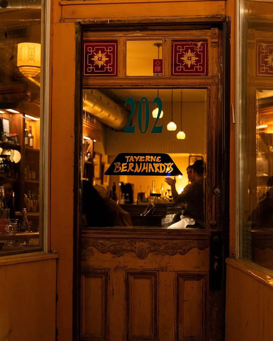 Exterior of Taverne Berhardt's, low light interior
