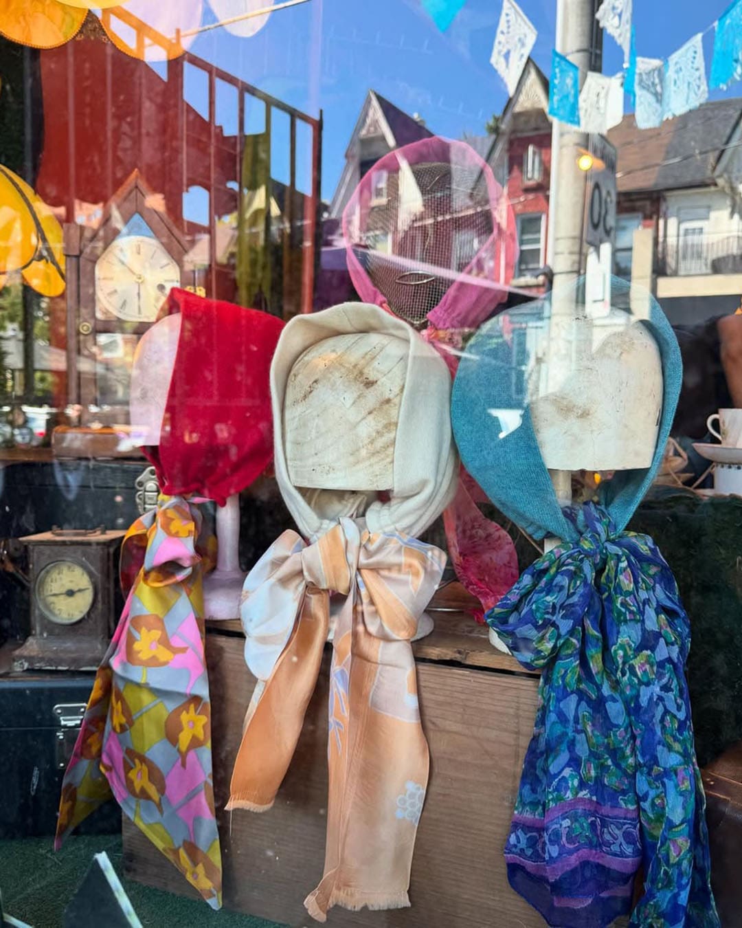 Hair wraps and scarfs on display in Courage My Love's window display