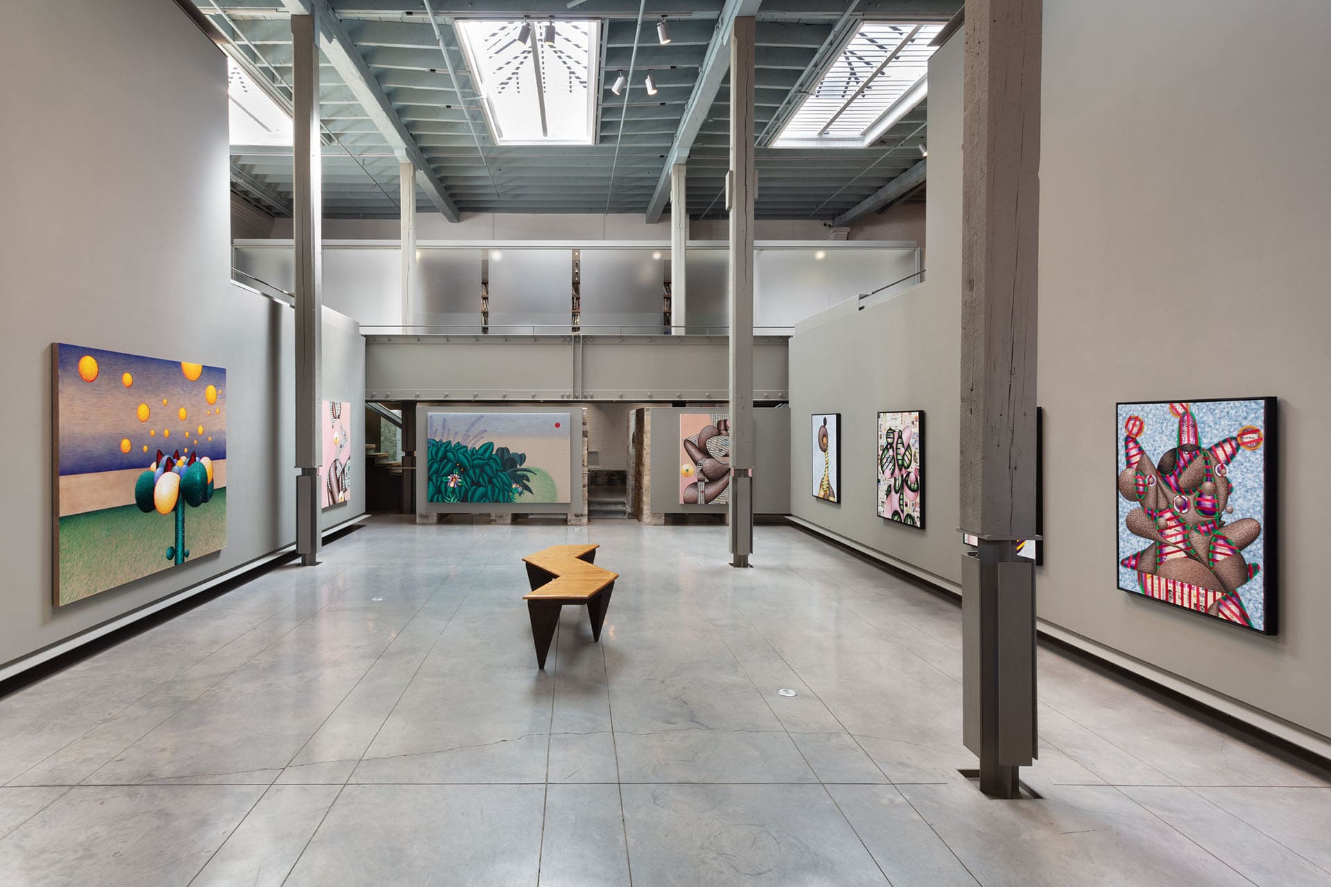 Artworks by Christian Butterfield on display at Corkin Gallery. Modern airy interior with ceiling windows