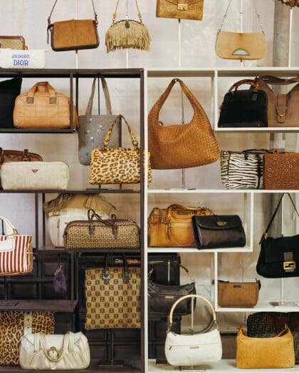 A collection of vintage designer handbags on a display at Sunday Variety at St. Lawrence Market