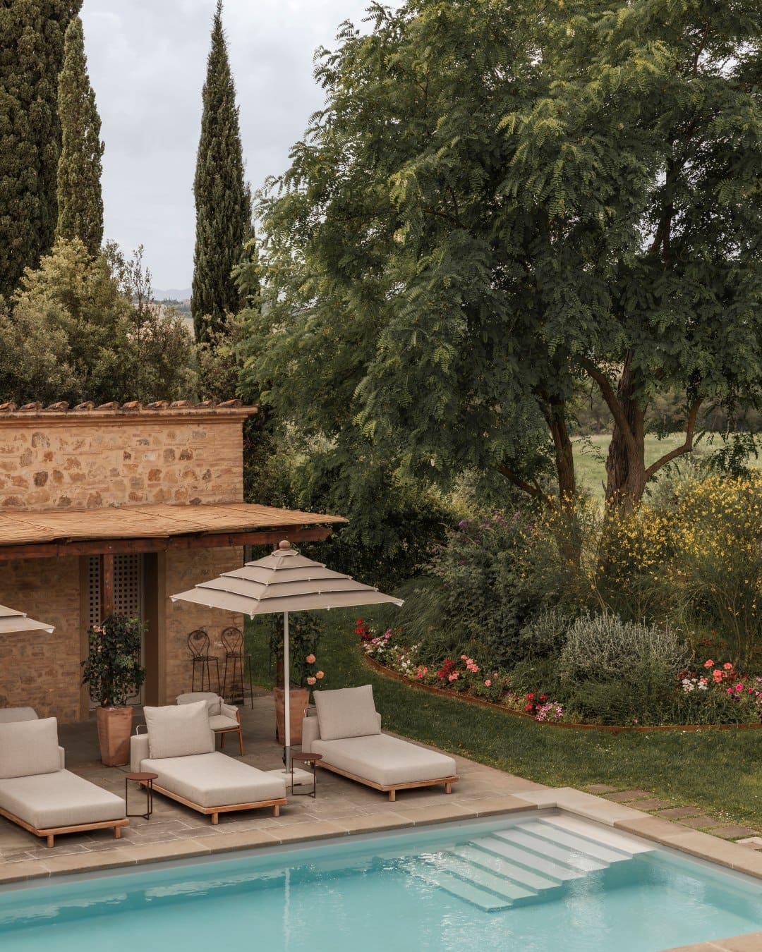 A sun lounger by the pool at Castelfalfi, Tuscany